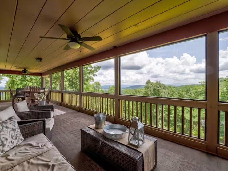 Charming wrap-around deck with fire pit seating and mountain views all around. Inside or out, this cozy cabin has the perfect setup for laughter, grilling, and soaking in the hot tub.