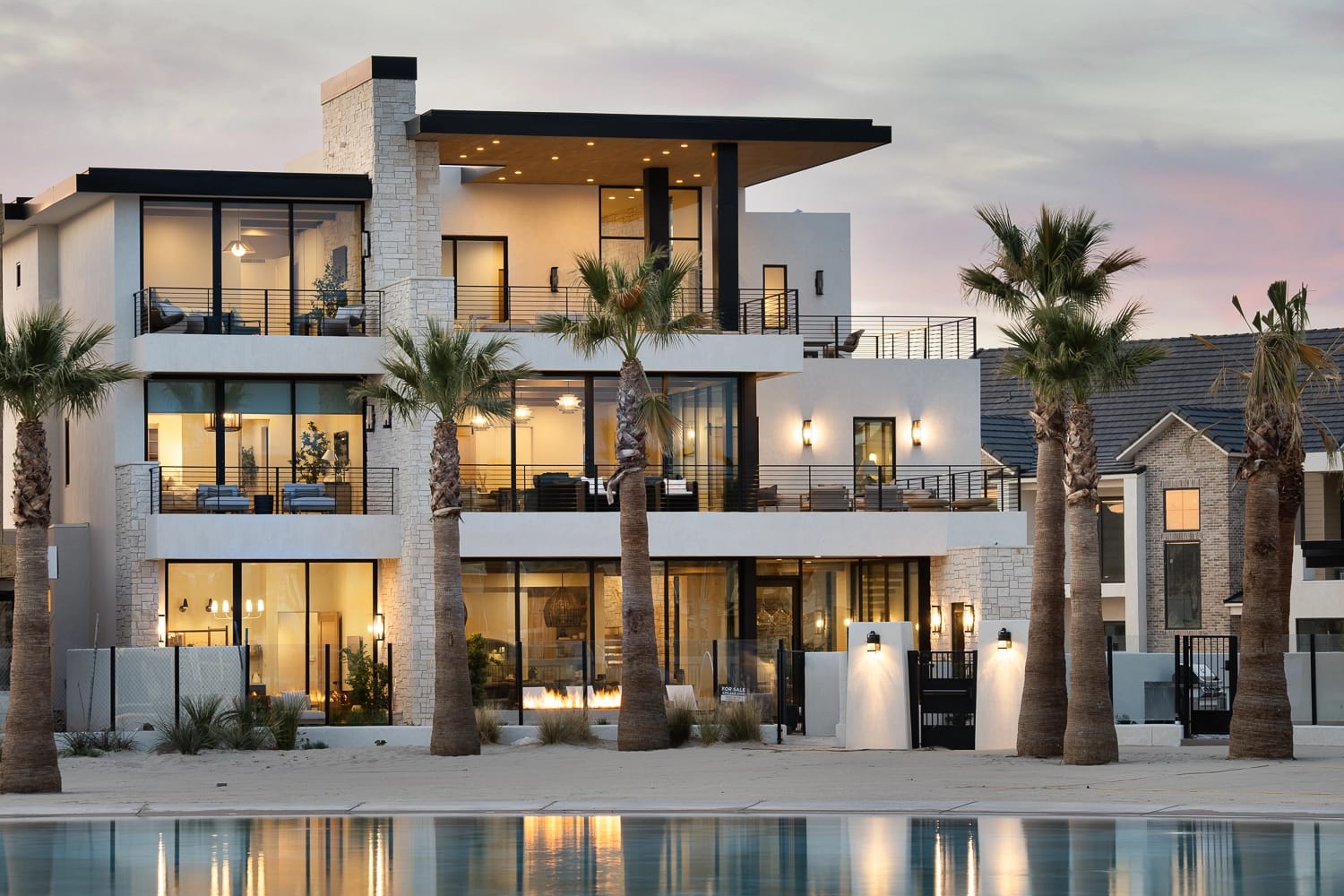 An aerial view of a resort community in St. George, Utah, surrounded by red rock cliffs and family-friendly pools. The mix of modern vacation homes and desert scenery makes it a perfect spot for group getaways.