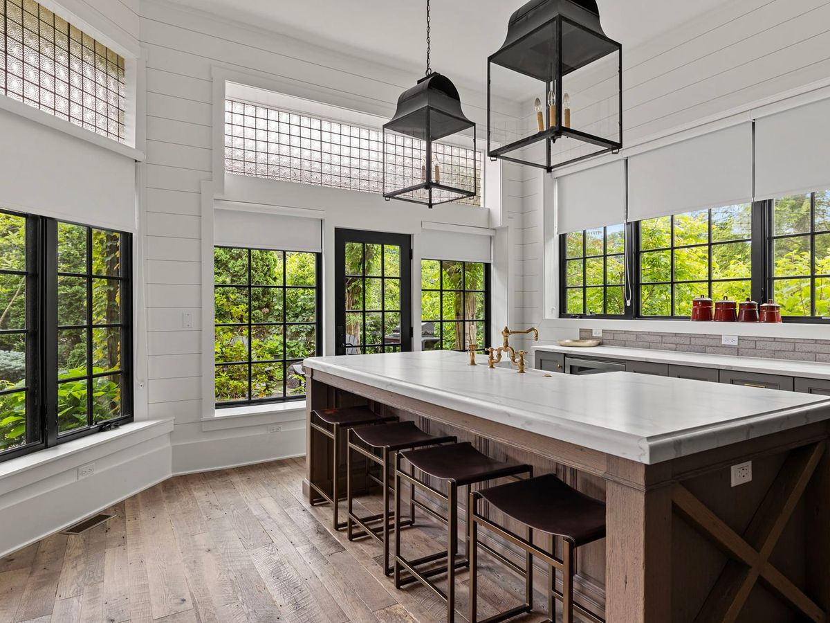 Charming designer bungalow with wide-open living space, antique details, and sun-drenched windows. Whether your pet is curled up by the sectional or exploring the fenced patio, this stylish spot feels like home.