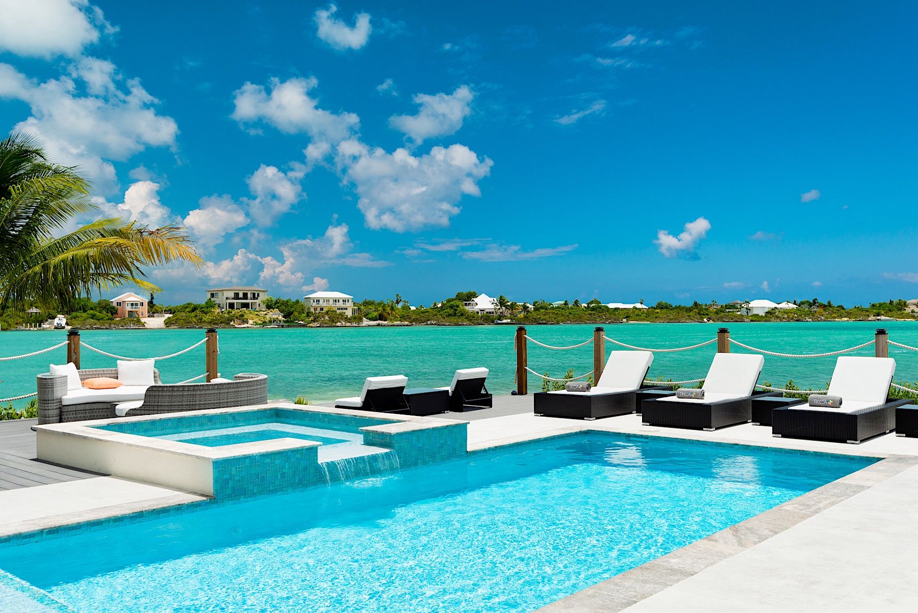 View of Private Pool and Ocean At A Luxury Turks And Caicos Vacation Rental