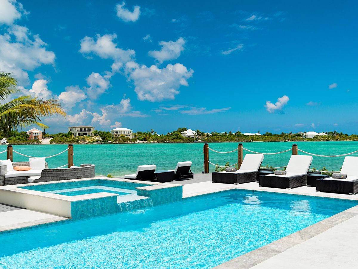 View of Private Pool and Ocean At A Luxury Turks And Caicos Vacation Rental
