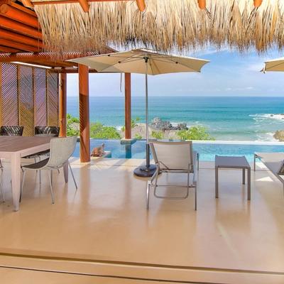 Indoor/outdoor living space overlooking the private pool.