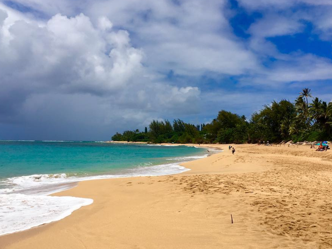 Tunnels beach in kauai with clouds overhead