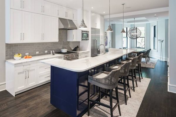 View of kitchen with plenty of seating.