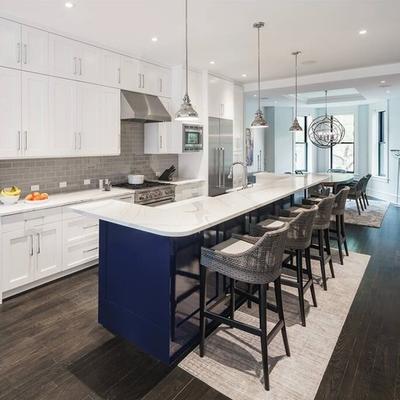 View of kitchen with plenty of seating.