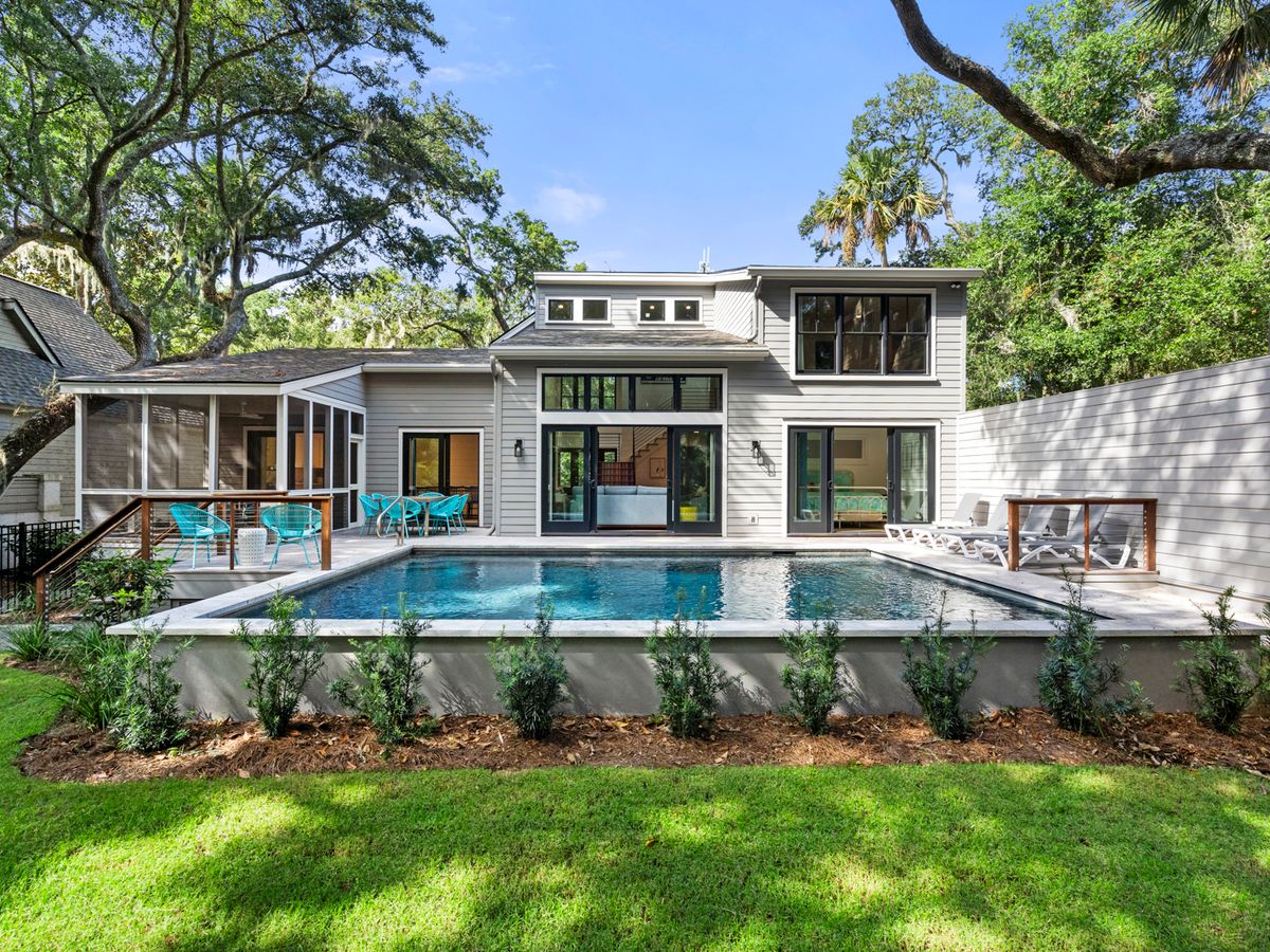 414 Amaranth Road is a luxury home on Kiawah Island’s West Beach with a private pool, screened porch, and sunny patio. Surrounded by trees and perfect for relaxing after beach days or bike rides through the island.