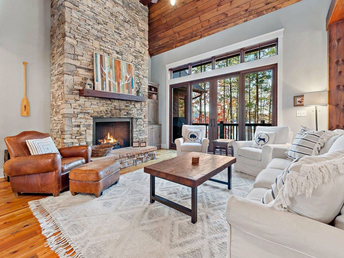 Bluegill Lodge is a lakefront gem with luxury amenities, a private boat dock, and stunning views from a spacious deck and screened porch. Your pet can join the adventure, and guests enjoy access to Camp Lake James amenities.