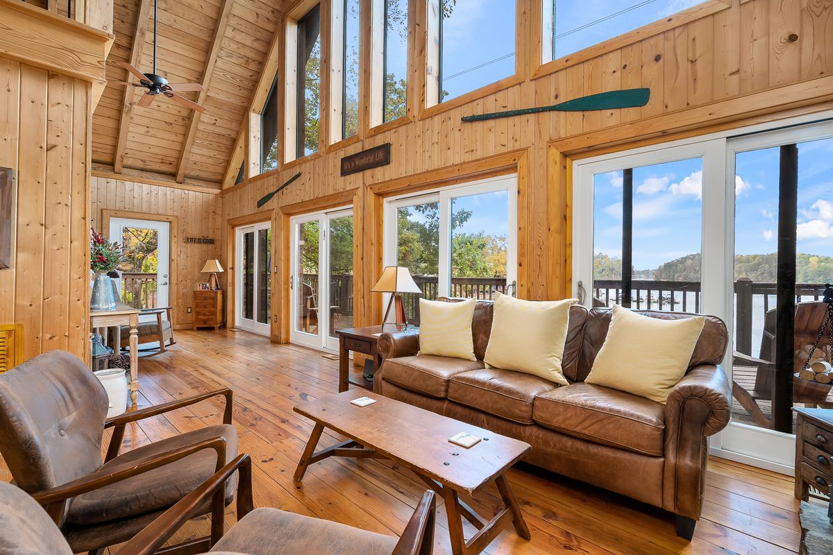 Living space with lake views in The Hangout at Lake Keowee.