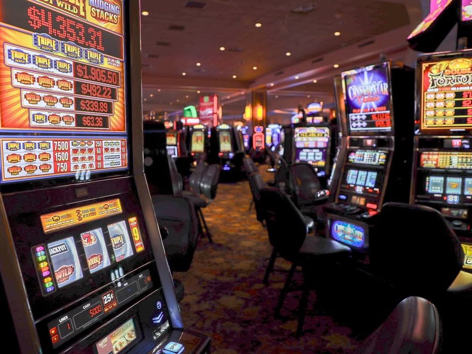 Colorful slot machines glow across the lively gaming floor at Four Winds Casino. Guests can try their luck, enjoy live entertainment, and dine all in one exciting venue.