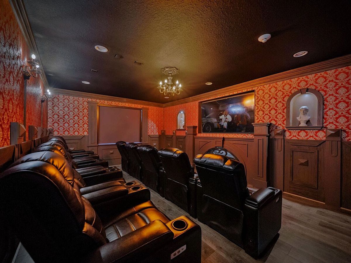 Haunted Mansion Themed Theater with Tiered Seating In Luxury Orlando Vacation Rental