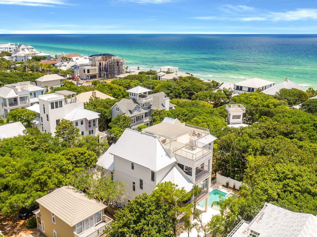 Seagrove Beach offers a wide stretch of soft white sand and gentle Gulf waves, surrounded by lush coastal greenery. It’s a favorite for vacationers who love both relaxation and easy access to 30A’s best dining.