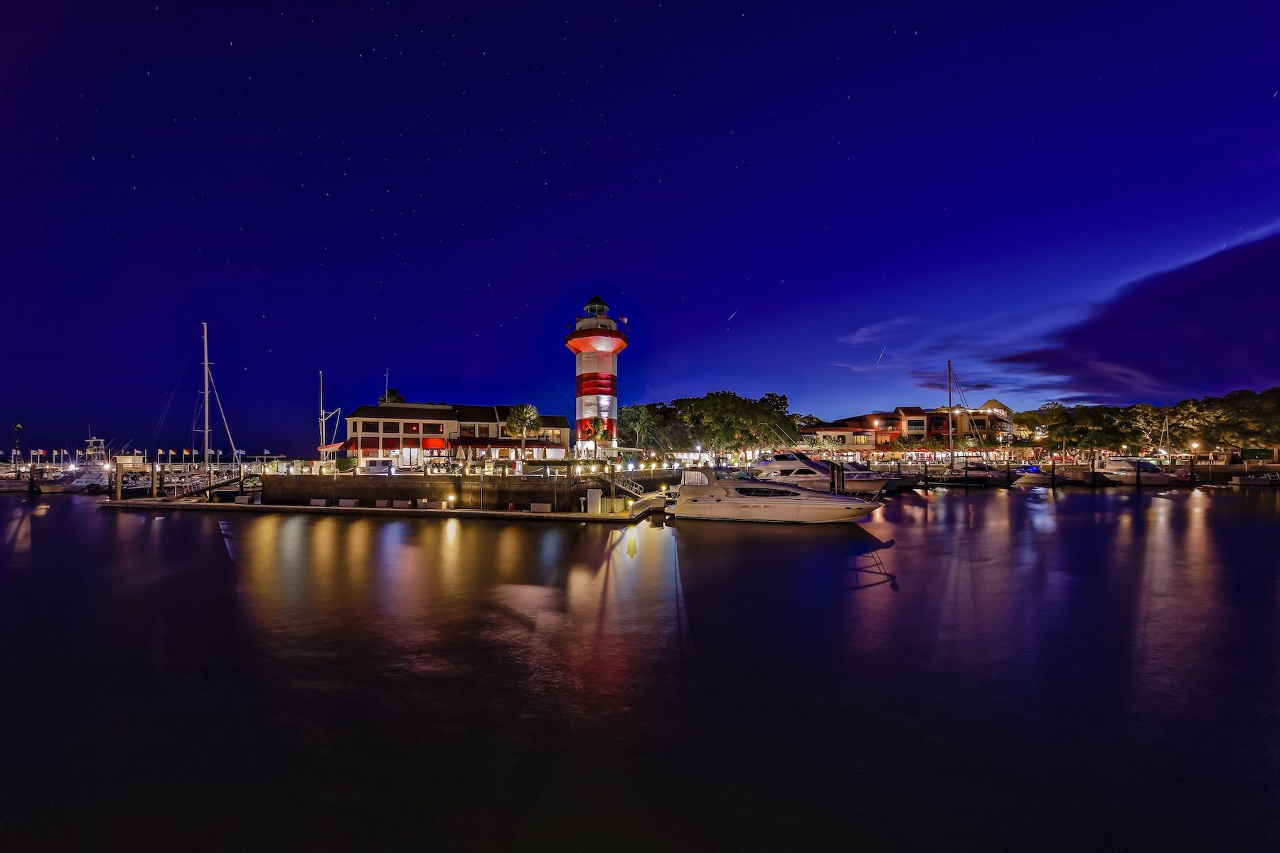Downtown View of Hilton Head Island and Seapines with its iconic, historic lighthouse by night.
