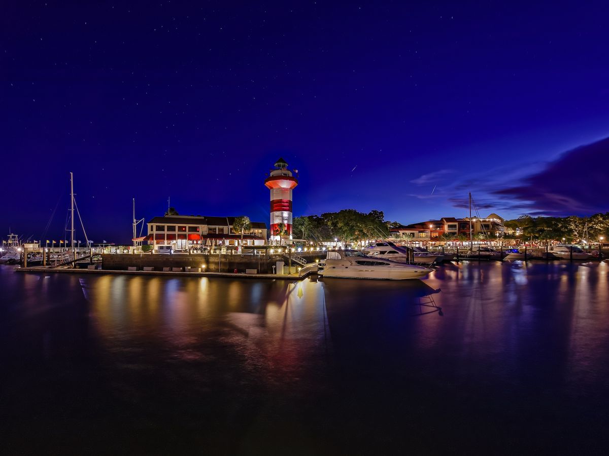 Downtown View of Hilton Head Island and Seapines with its iconic, historic lighthouse by night.
