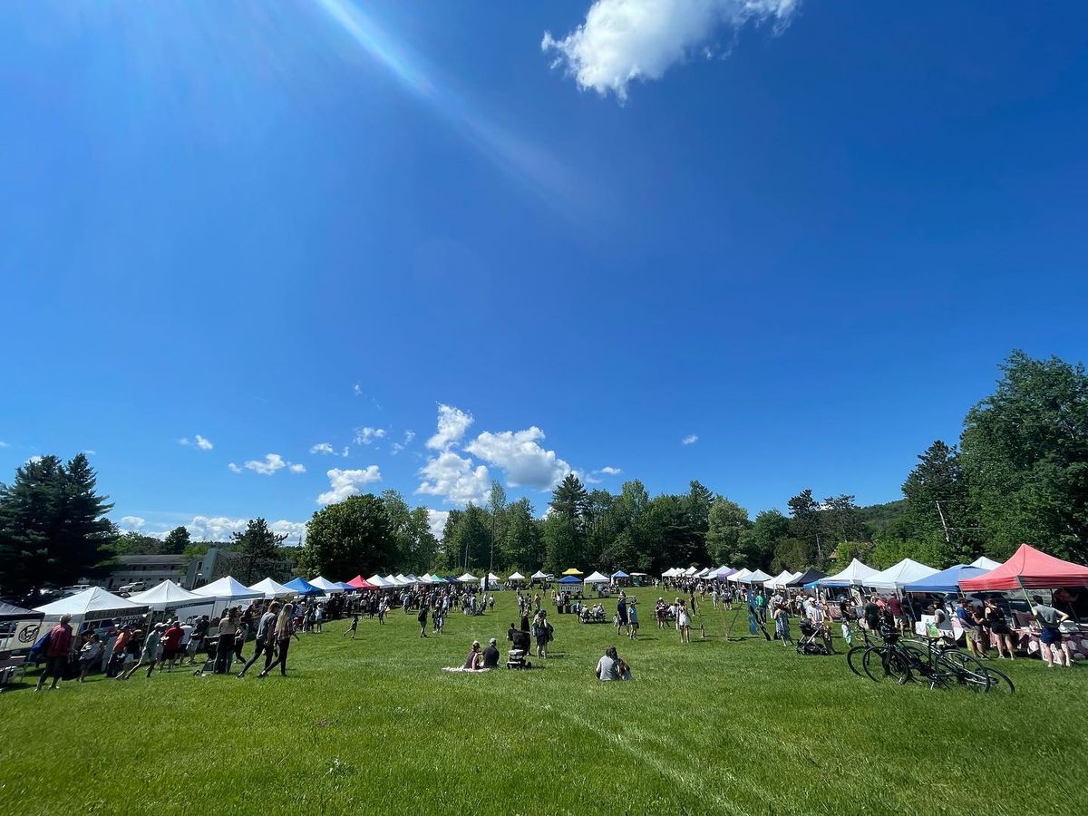 A peaceful fall landscape in Stowe filled with colorful trees, rolling hills, and mountain views. This scenic setting reflects the local charm and craftsmanship you’ll find when shopping at Stowe’s artisan markets and small shops.