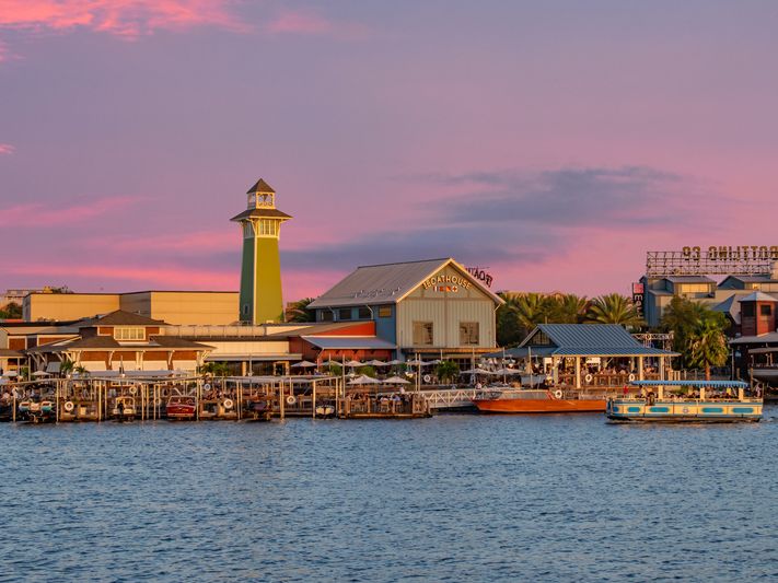 View of Disney Springs from water at Sunset in Orlando, FL