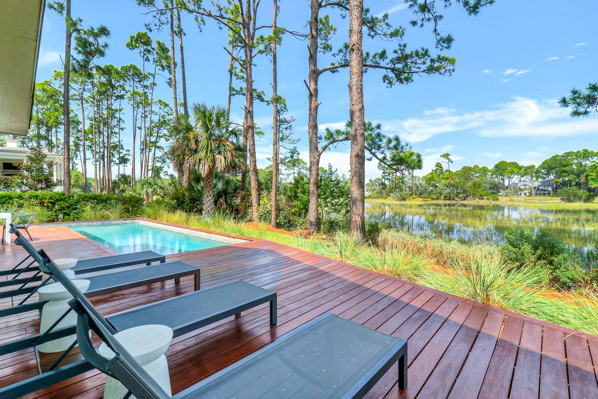 Exterior view of a Hilton Head Island vacation rental with a private pool.