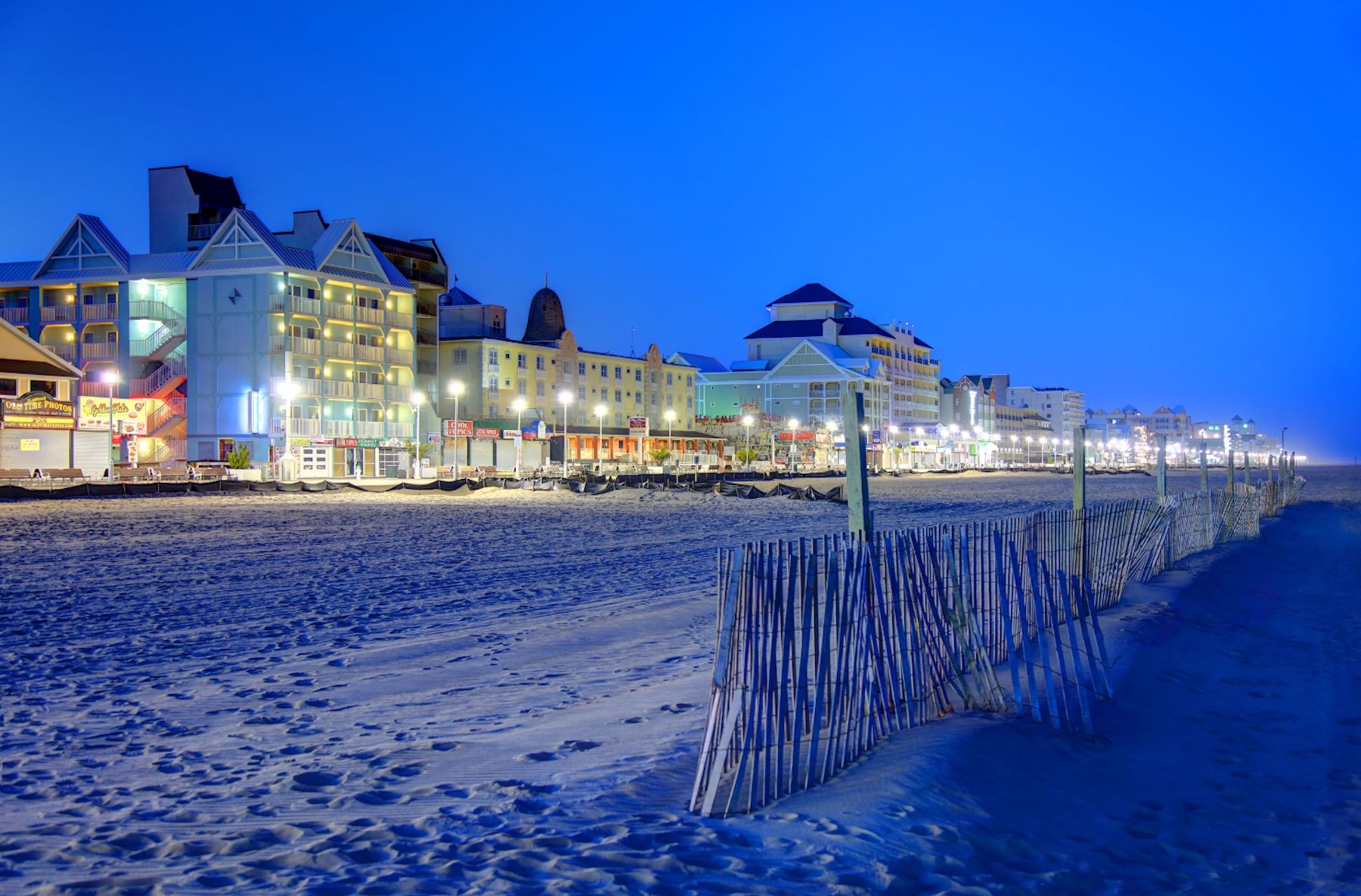 View of Ocean City at night from the beach
