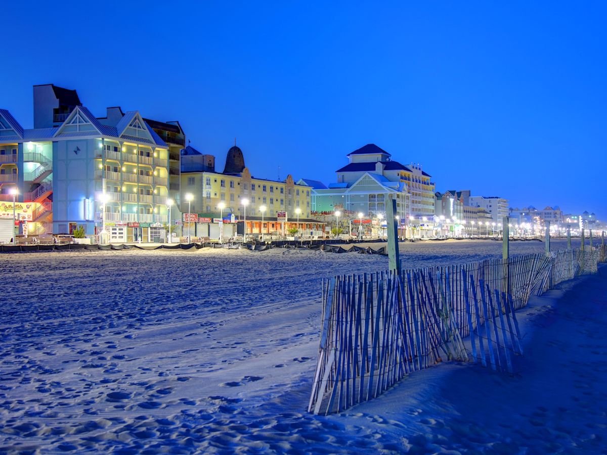 View of Ocean City at night from the beach