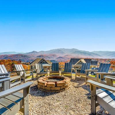 Outdoor seating area with a fire pit at The Lodge.