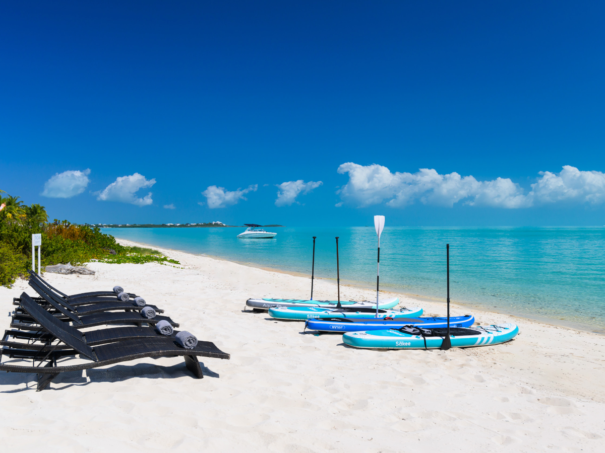 Paddle Boards and Beach Chairs on Beach in Turks and Caicos