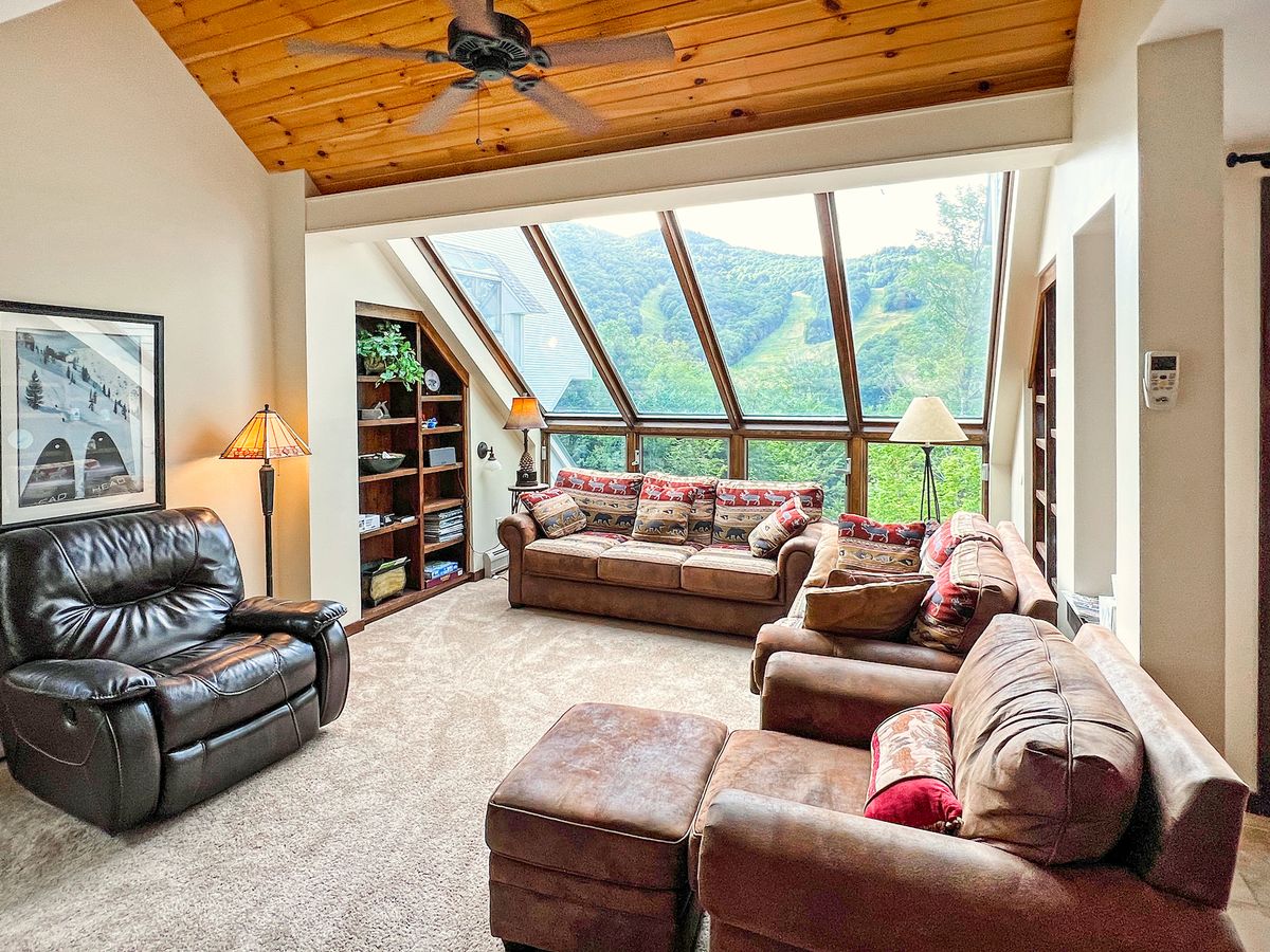 Living Room with Mountain View At Killington Ski-In/Ski-Out Vacation Rental 