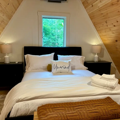 Loft bedroom in Tiny Mansion.