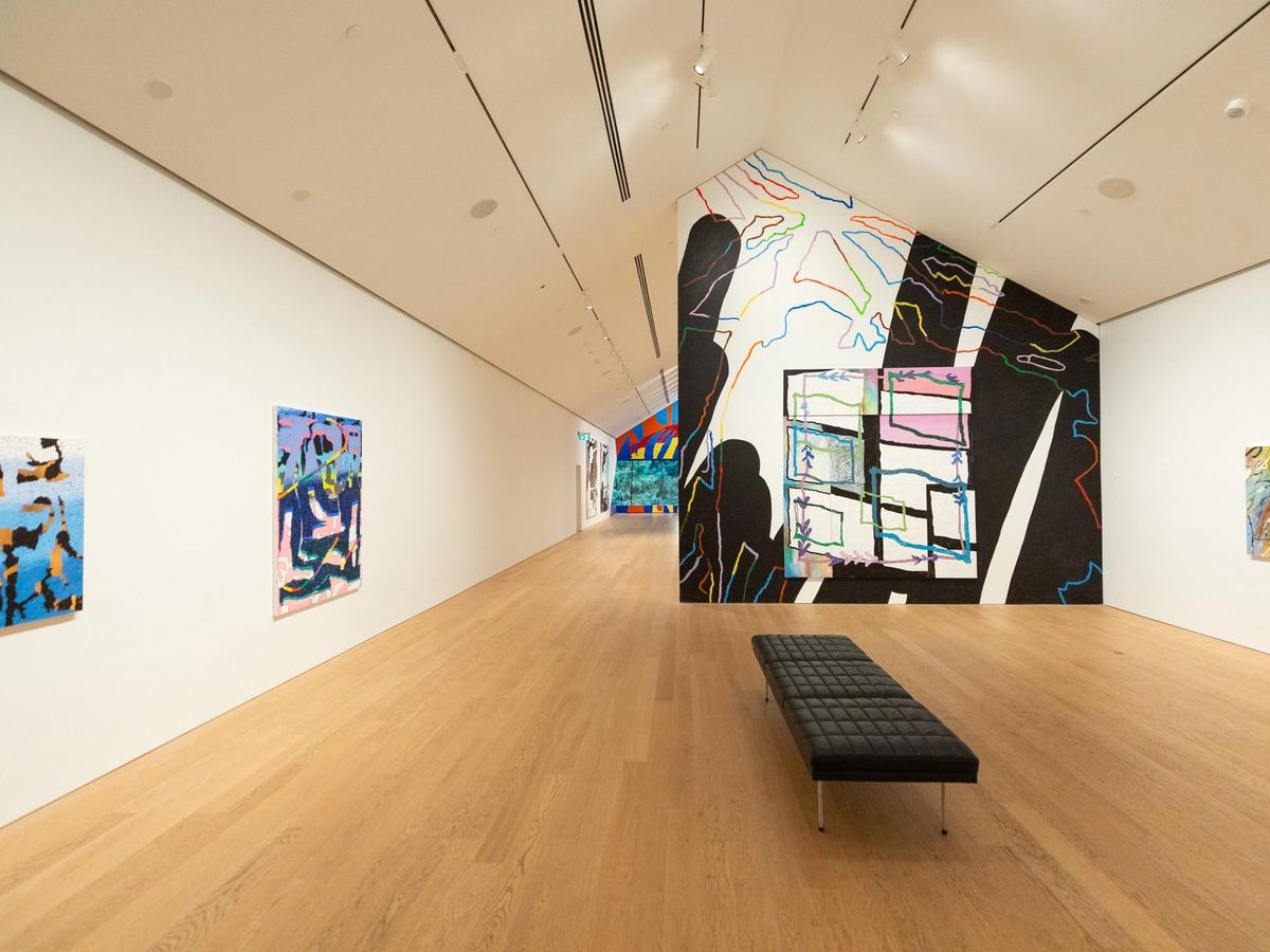 Inside the Audain Art Museum in Whistler, colorful modern art fills the bright gallery space. Clean white walls and wood floors create a calm setting to explore Canadian and Indigenous artwork. It’s a must-visit cultural stop in Whistler Village.