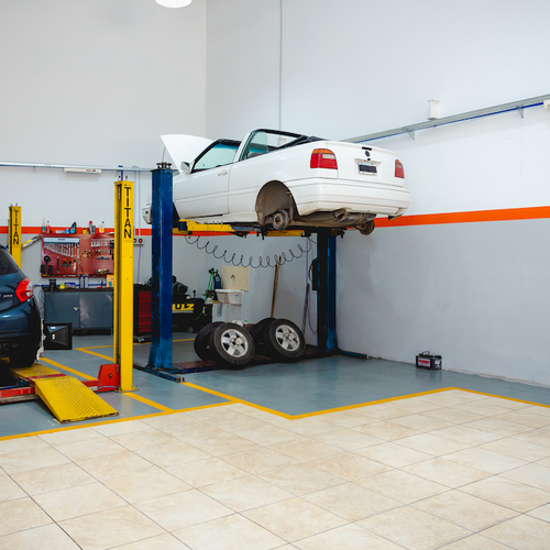 Coches elevados para rotación de ruedas