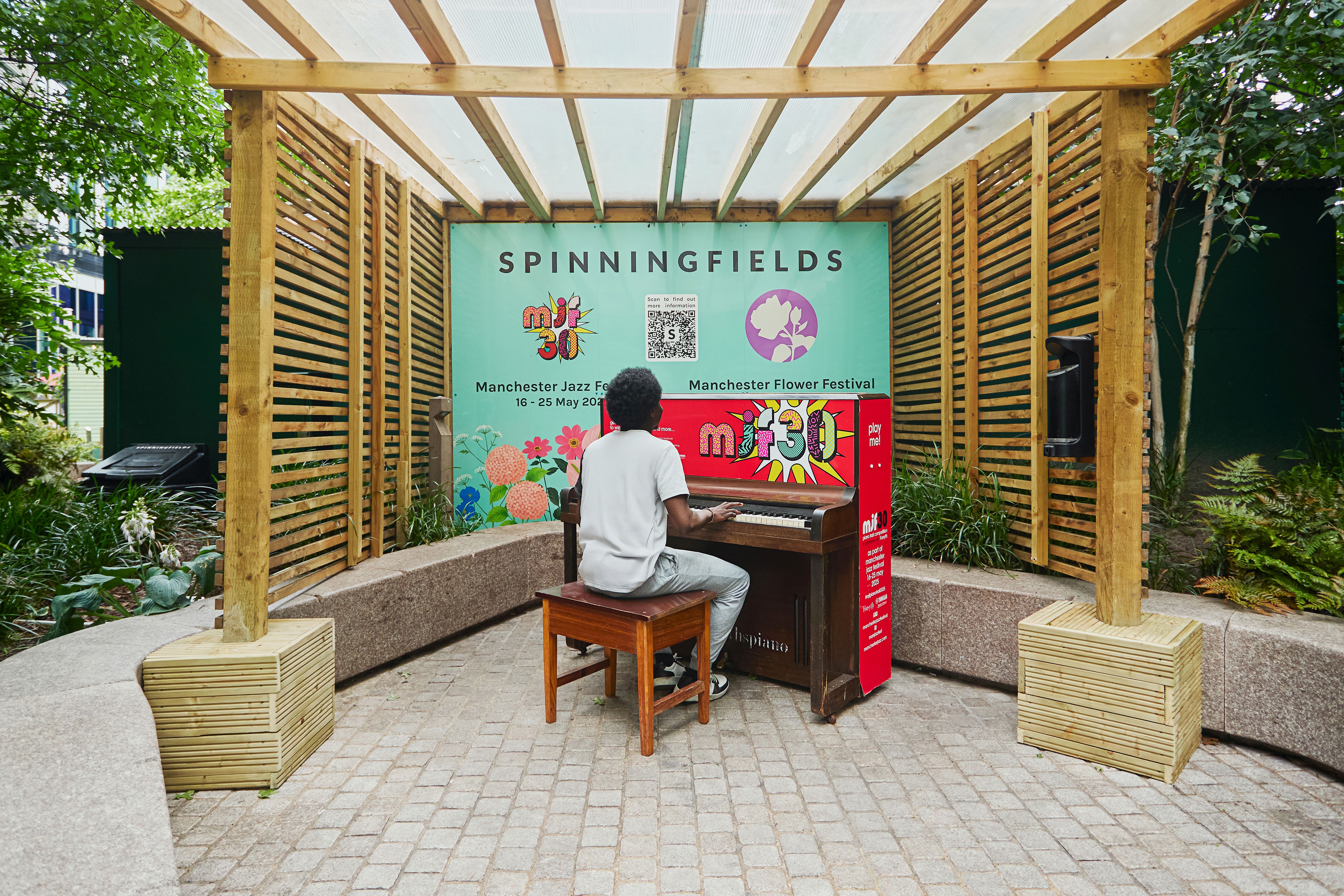 Man at Piano in Spinningfields
