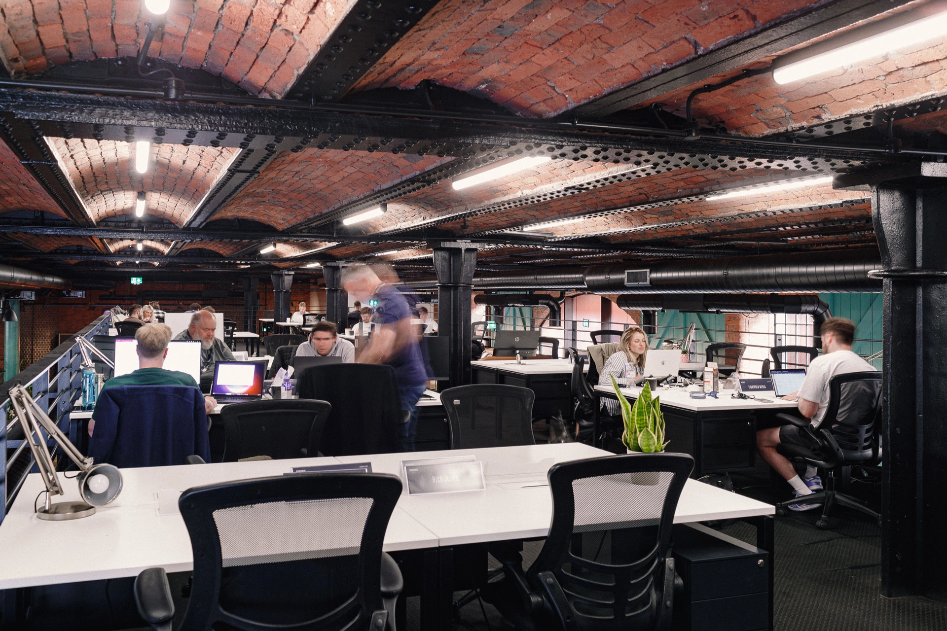 People working around large table