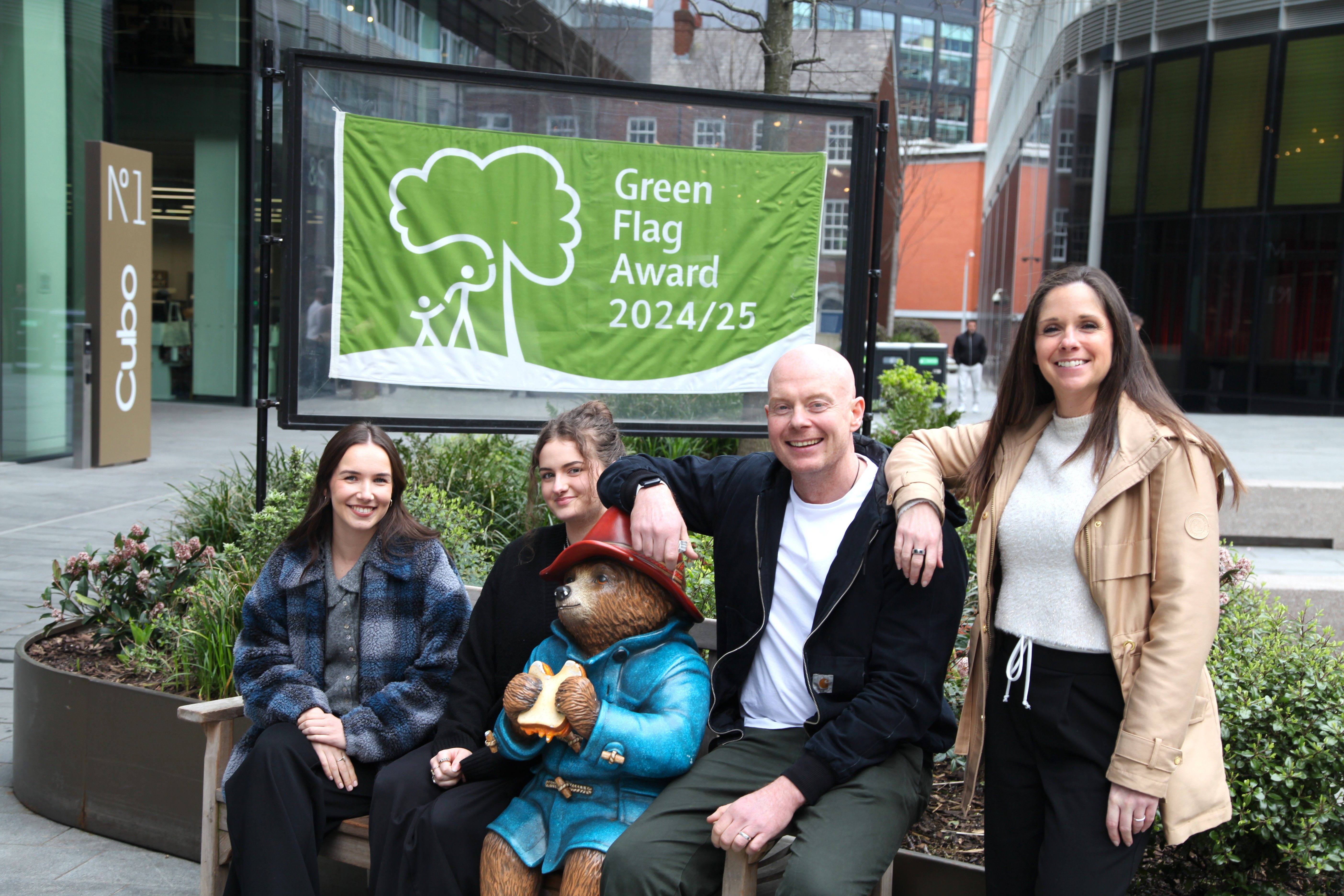Emily, Caitlin, Pete and Gill stood with Paddington Bear statue