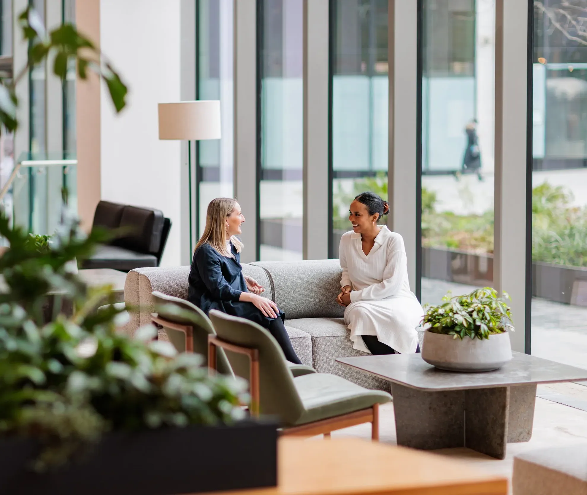 People chatting in office