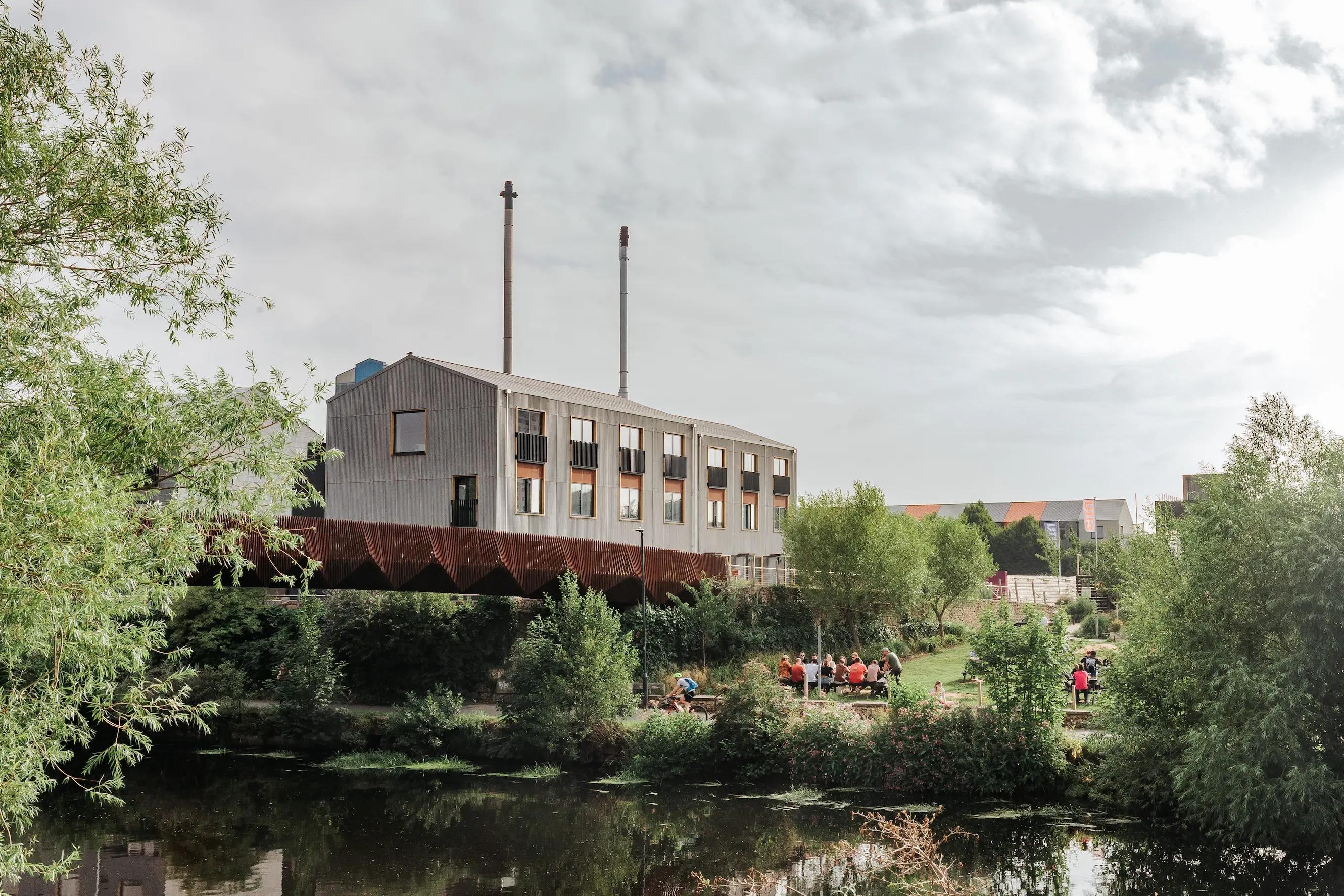 River, filed with people in and building