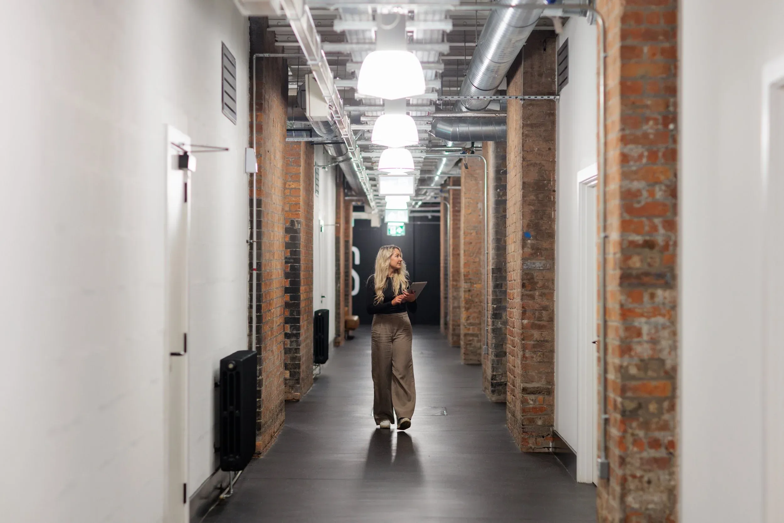 Person walking through Bonded Warehouse corridors