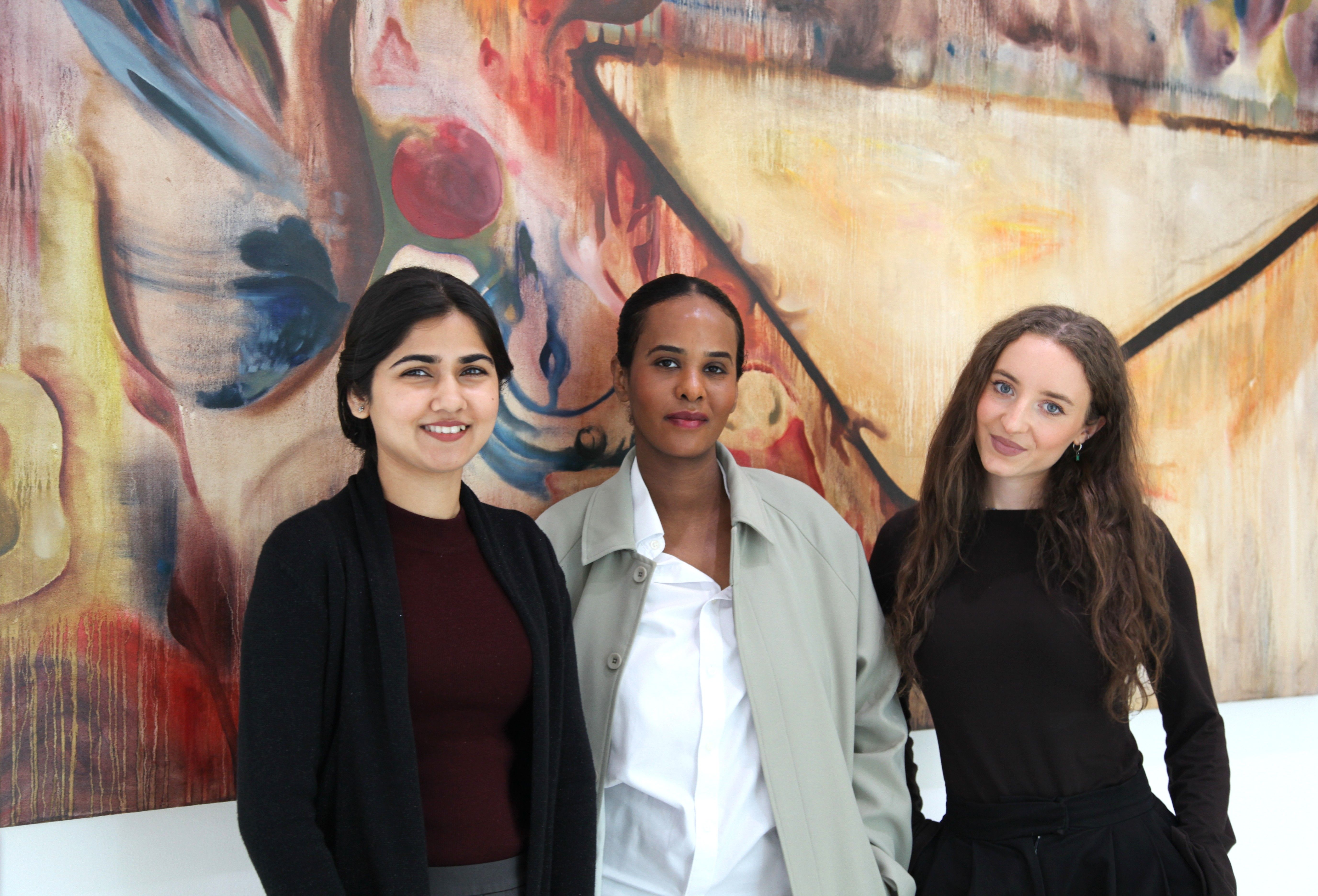 Mallika, Fatima and Amy in front of an art piece in No. 1 Spinningfields