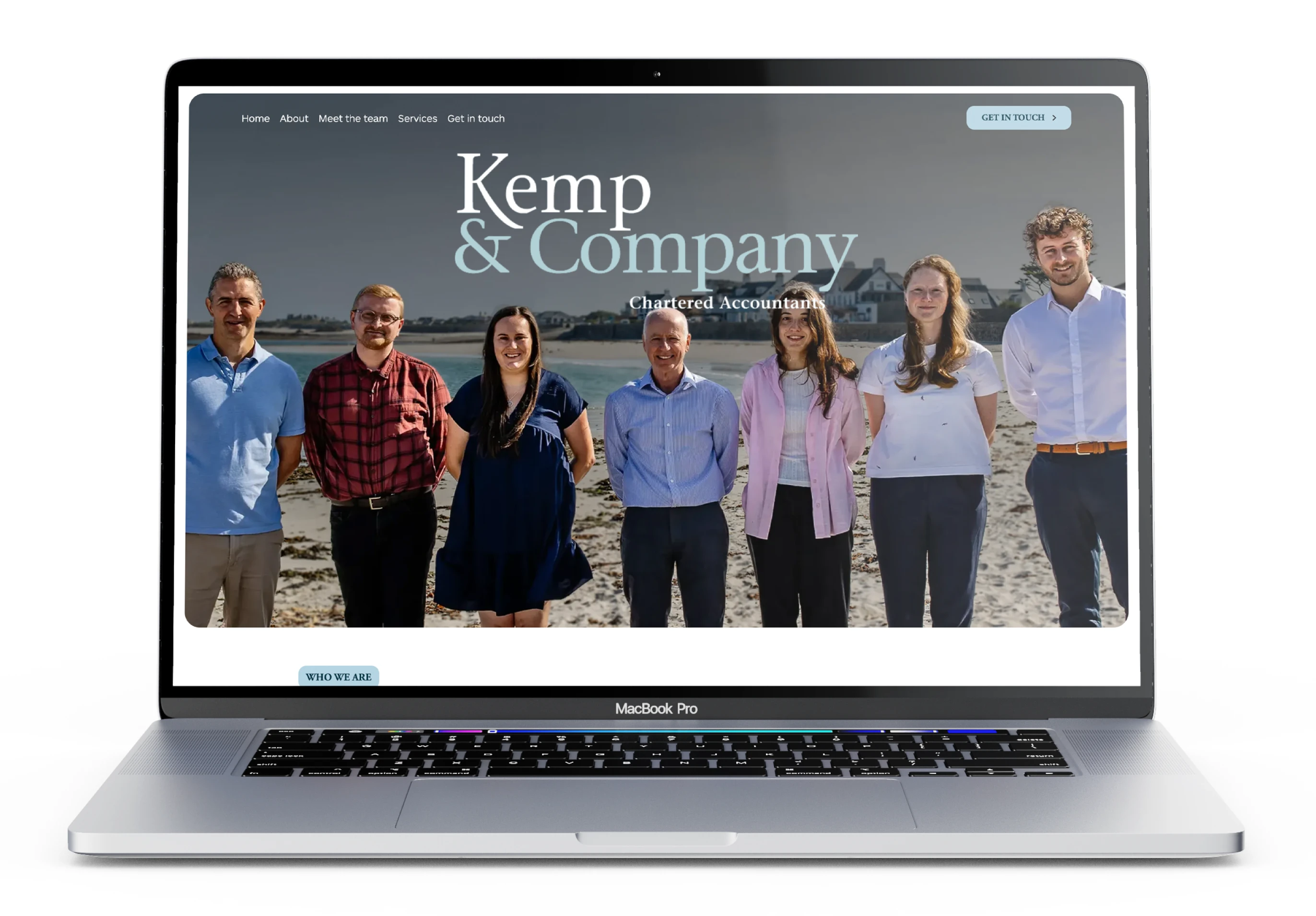 Kemp & Company website mocked up on a MacBook