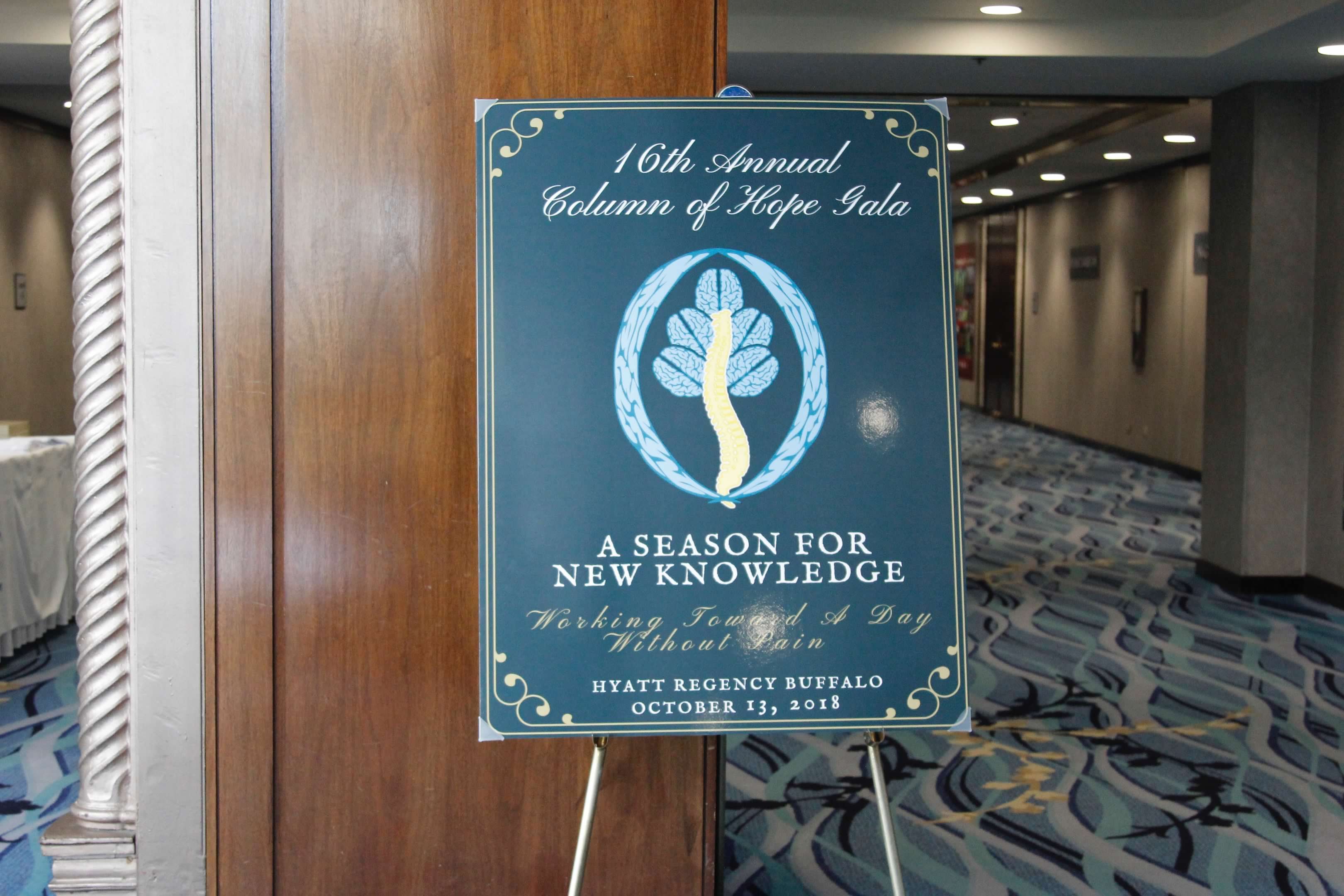 A Season for New Knowledge Gala poster, 2018, on its easel at the Hyatt Regency Buffalo
