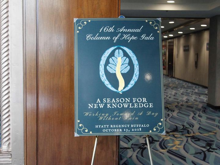 A Season for New Knowledge Gala poster, 2018, on its easel at the Hyatt Regency Buffalo