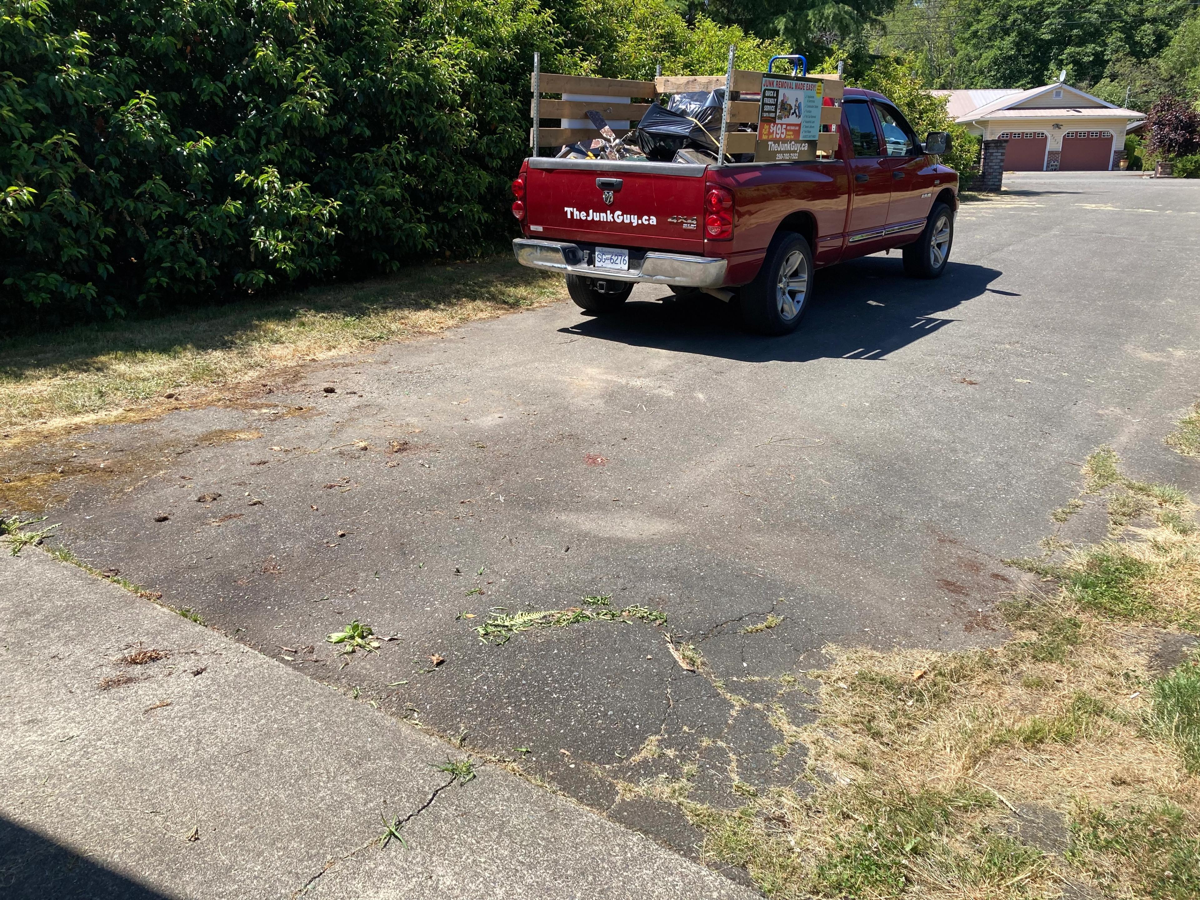 Empty driveway with the final half load sitting in the truck
