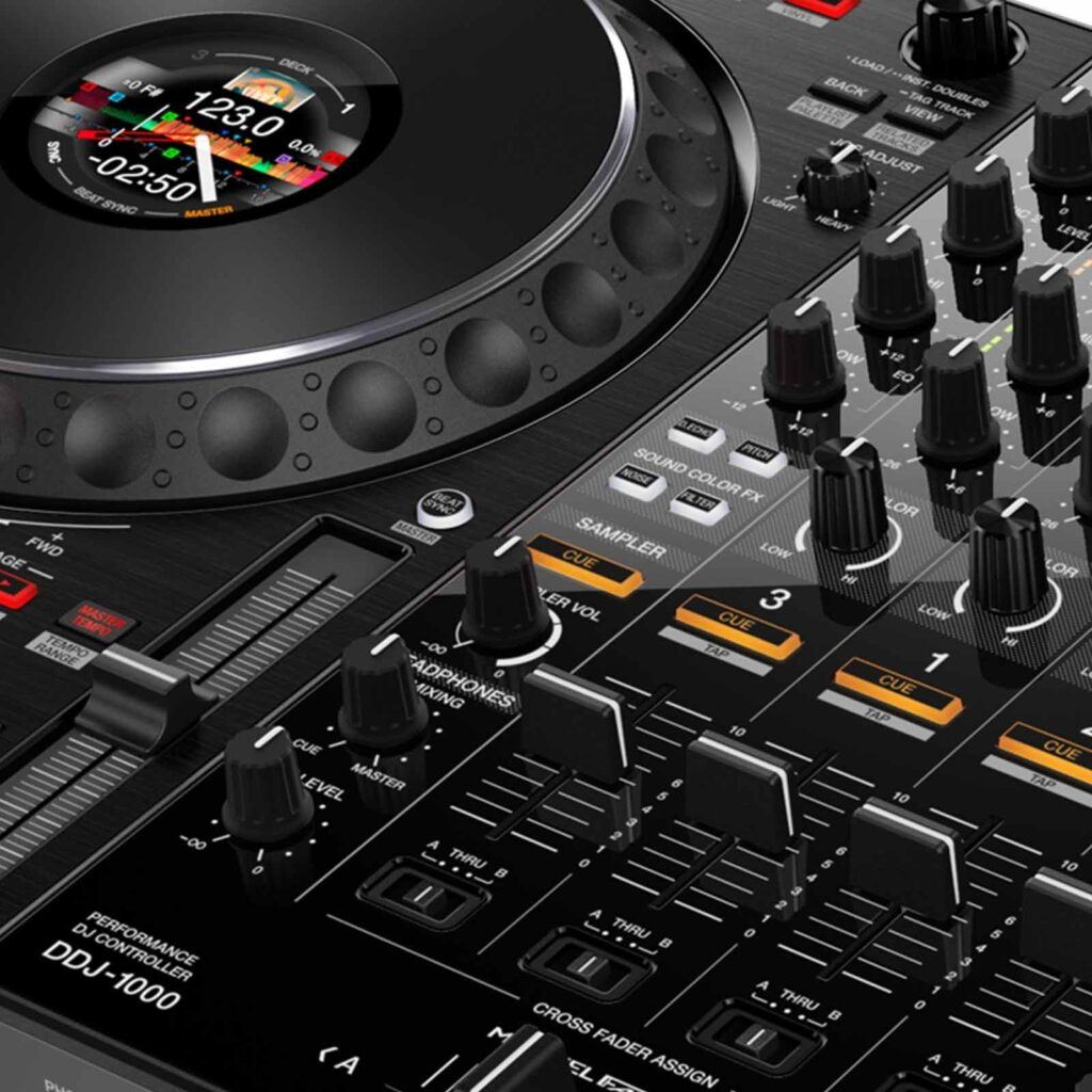 Close-up of the Pioneer DDJ-1000 jog wheel display showing tempo and time, beside the mixer’s Sound Color FX buttons.