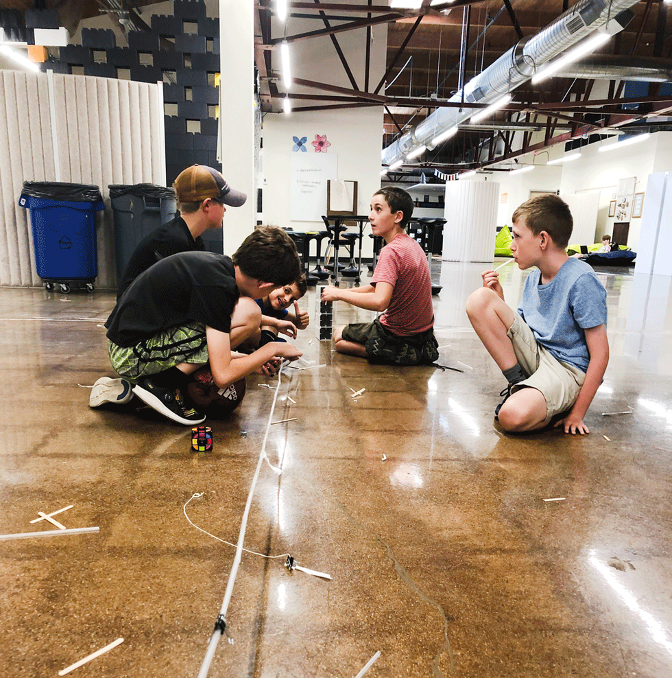 6th grade Bridge Building design challenge underway