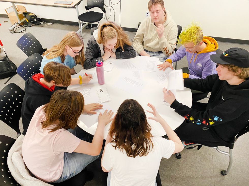 Brains sizzle! Concurrent Enrollment English Literature class hard at work!