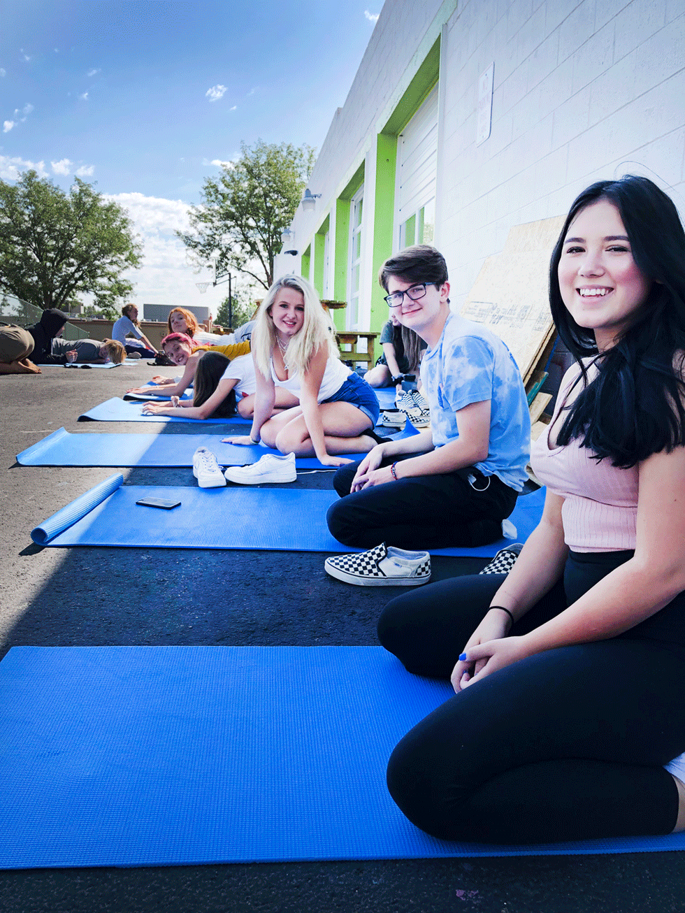 Outdoor yoga as part of our wellness experience