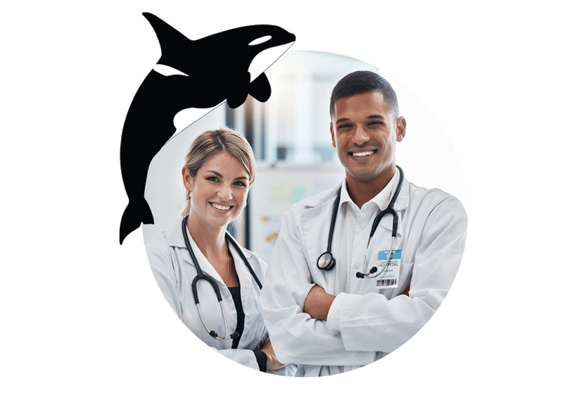 Two smiling medical professionals — a woman and a man, both wearing white lab coats with stethoscopes — stand confidently in a hospital setting. The composition is framed within a soft circular vignette. To the upper left, a stylized black orca silhouette overlays the scene, representing the Be Orca brand identity — the calm, prepared expert who is the apex figure in the room. The image illustrates the role of the medical expert: dignified, confident, and ready to analyze complex records and present opinions in legal proceedings.
