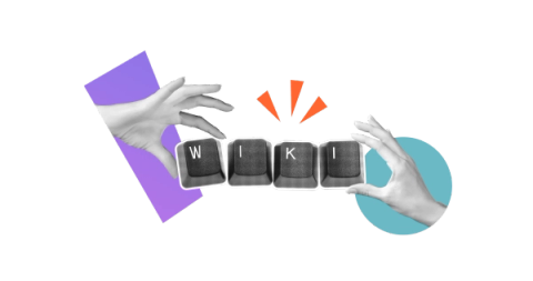 Two hands reaching out to key caps that spell the word "Wiki"