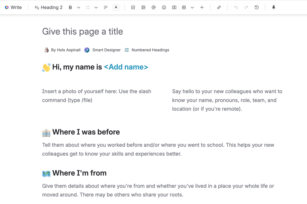 Screenshot of the Confluence page editor showing the introductory blog template. The page title area says “Give this page a title”, and beneath it are author and template labels: “By Hols Aspinall”, “Smart Designer”, and “Numbered Headings”. The first main heading reads “👋 Hi, my name is <Add name>”, followed by placeholder guidance in two columns asking the user to insert a photo and introduce themselves. Lower on the page are section headings “Where I was before” and “Where I’m from”, each with explanatory text. A formatting toolbar runs across the top with options such as heading style, bold, insert items, links, undo, and redo.