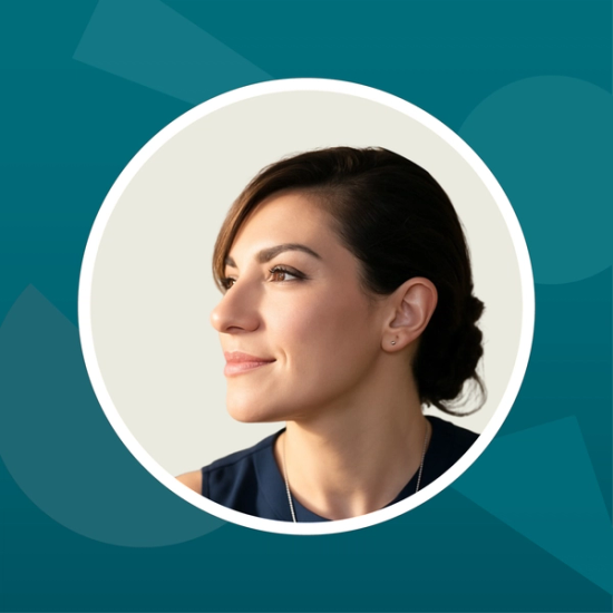 A headshot of Eleni Miliou against a teal background