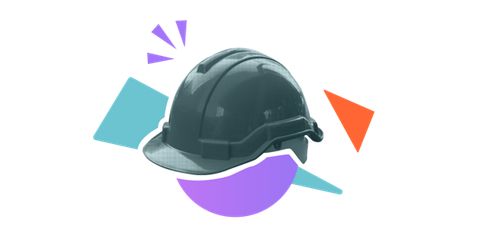A hard hat surrounded by colourful cut-out shapes