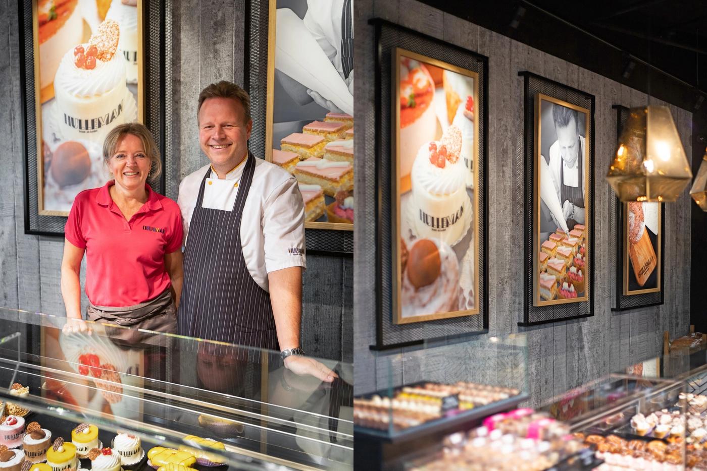 Twee medewerkers achter de gebaksvitrine bij Bakker Hulleman in Amstelveen.