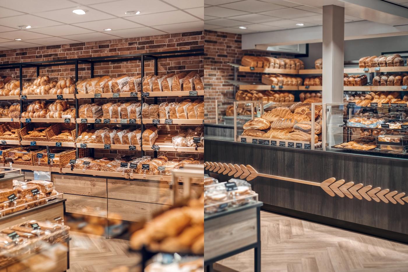 Uitgebreide broodpresentatie bij Bakkerij Hamersma in Grootegast, met ambachtelijke broden, warme houtaccenten, bakstenen wanden en maatwerk winkelmeubilair ontworpen door Infrashop.